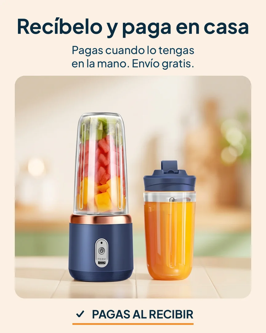 Licuadora portátil con 2 vasos: Licuadora portátil con jugo de naranja en la cocina